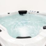 Platinum Spas Happy hot tub seating area with headrest and bubbling jets
