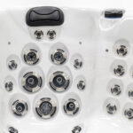 Platinum Spas Palma hot tub close-up of a headrest, control panel and illuminated LED jets