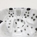Platinum Spas Palma hot tub close-up of the seating area showing rotational and directional jets