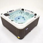 Platinum Spas Palma hot tub filled and running on a white studio background