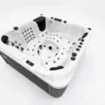 Platinum Spas Palma hot tub interior close-up showing the headrest, control panel and surrounding jets