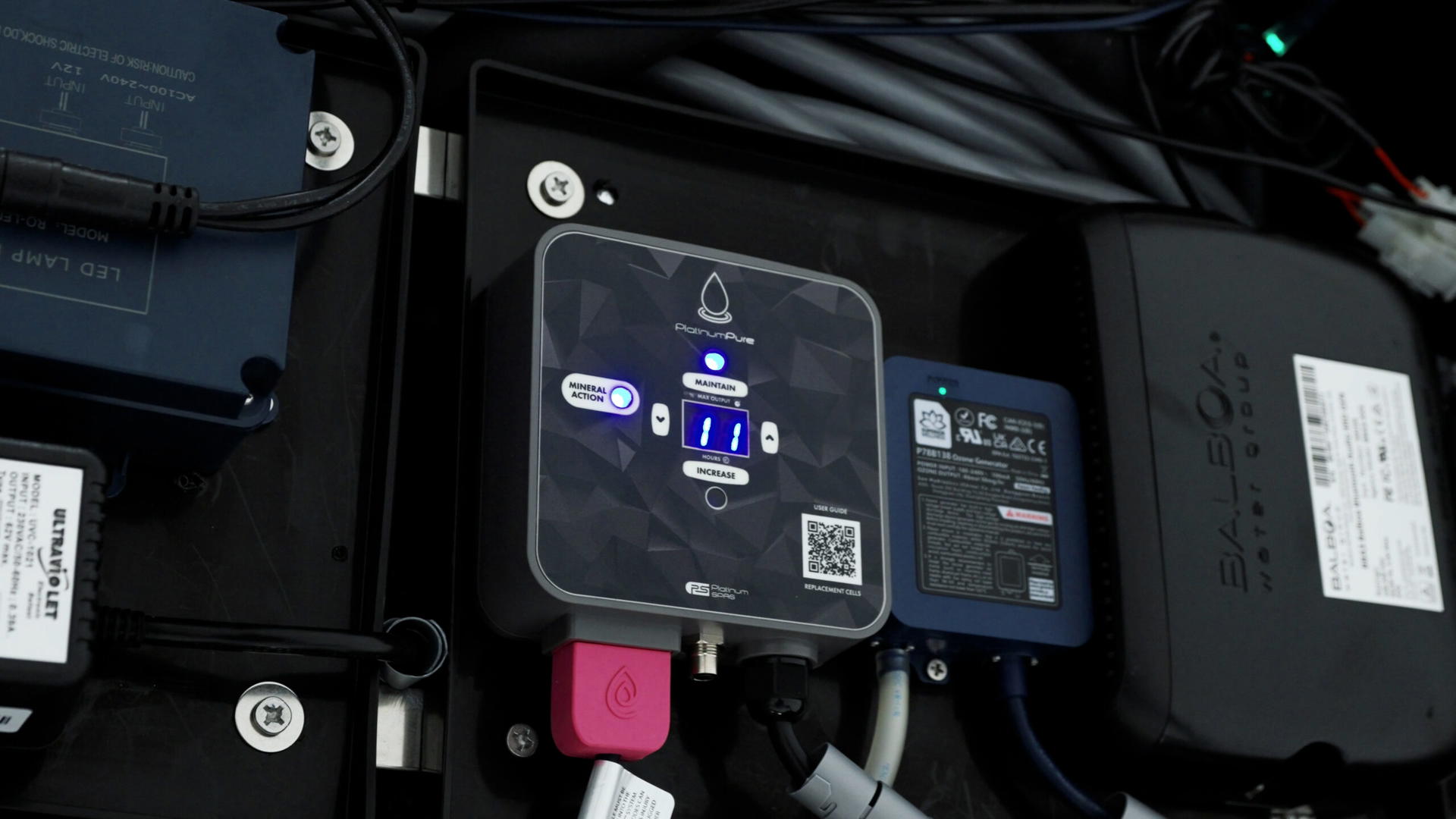 Platinum Spas Portofino hot tub control panel and wiring compartment inside the cabinet
