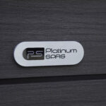 Platinum Spas badge set into the wood-effect cabinet paneling of a Reims hot tub