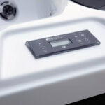 SpaTouch control panel on a Platinum Spas Reims hot tub, used to set temperature, jets and lighting