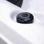 Drain valve cap on a Platinum Spas Reims hot tub, twisted open to release water for draining