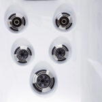 Five-jet cluster in a seat of a Platinum Spas Reims hot tub, angled for a shoulder massage