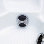 Single massage jet in the footwell of a Platinum Spas Reims hot tub