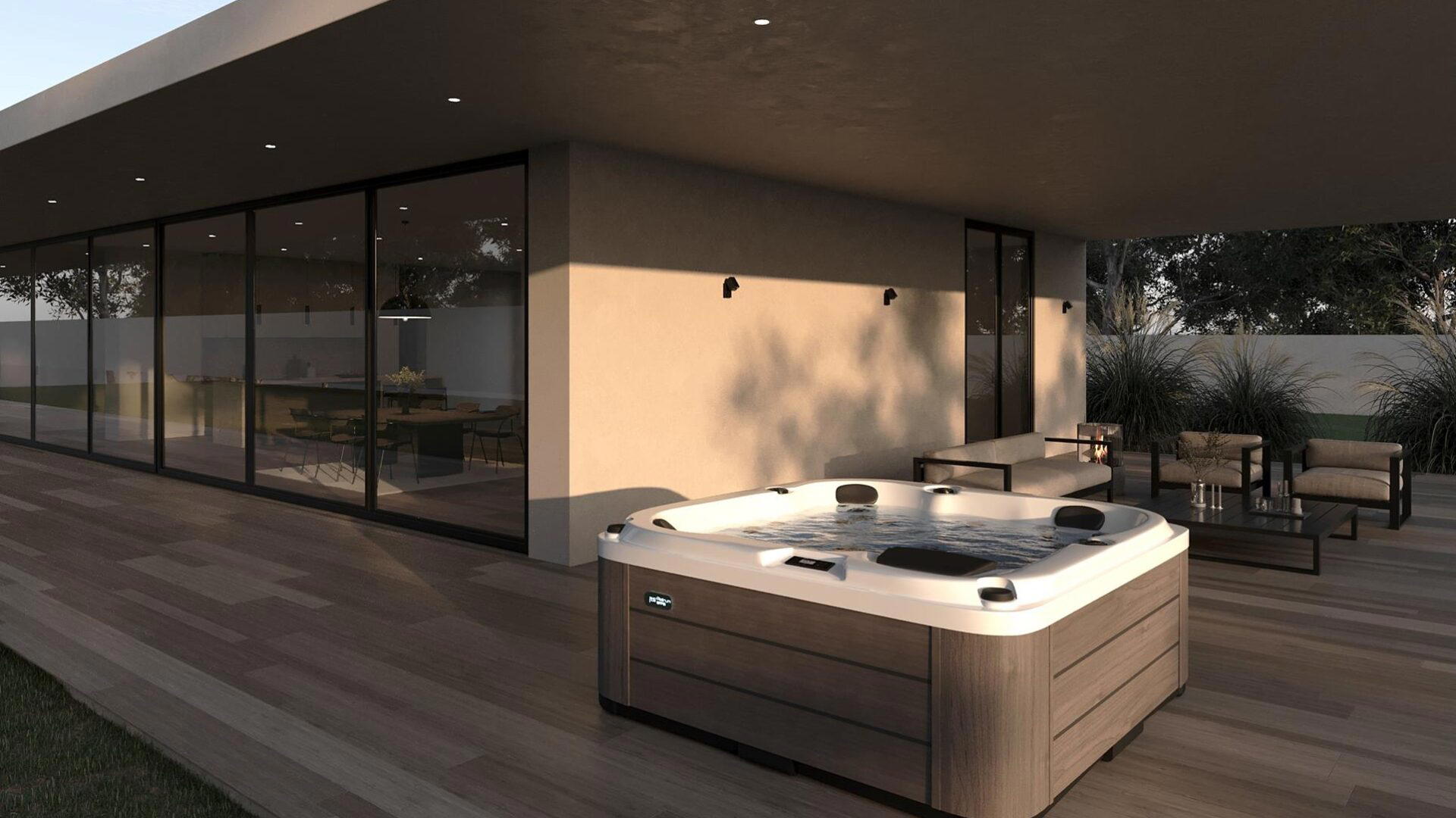 Platinum Spas Reims hot tub on a wooden deck in daylight beside a modern glass-fronted house