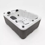 Platinum Spas Tahiti hot tub auxiliary control buttons set into the acrylic rim