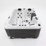 Platinum Spas Tahiti hot tub in Sterling Silver acrylic showing the full seating and jet layout