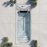 Platinum Spas Chronos Pro mini pool overhead view on a patio with potted plants and swim lane markers