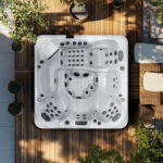 Overhead view of a Platinum Spas Portofino hot tub on a paved patio