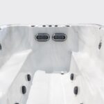 Platinum Spas Titan swim spa empty interior showing the twin swim current jets at one end