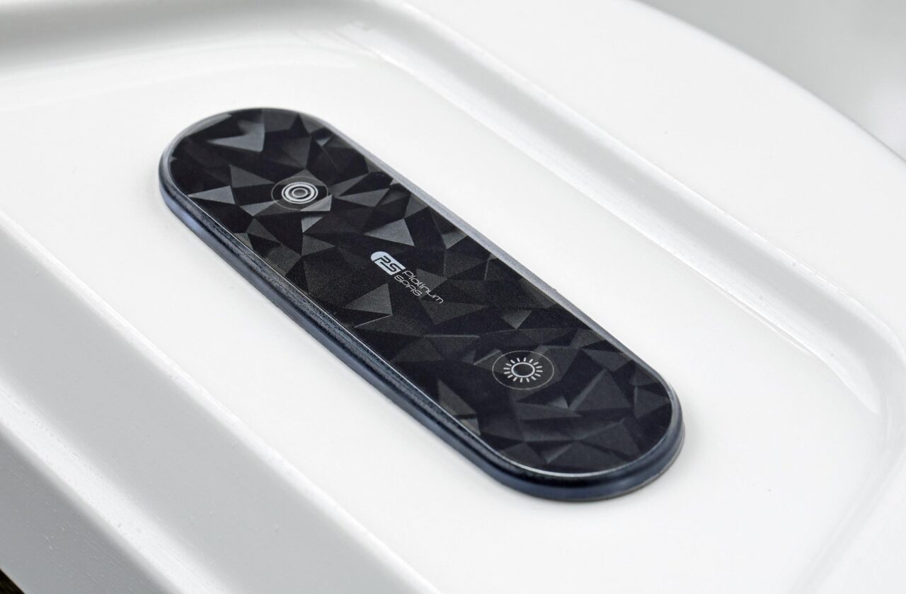 Platinum Spas Vacation Retreat hot tub topside control panel with touch controls set into the shell edge