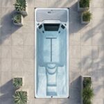 Platinum Spas Artemis Pro mini pool aerial view of sunken in-ground pool on paved patio with potted plants
